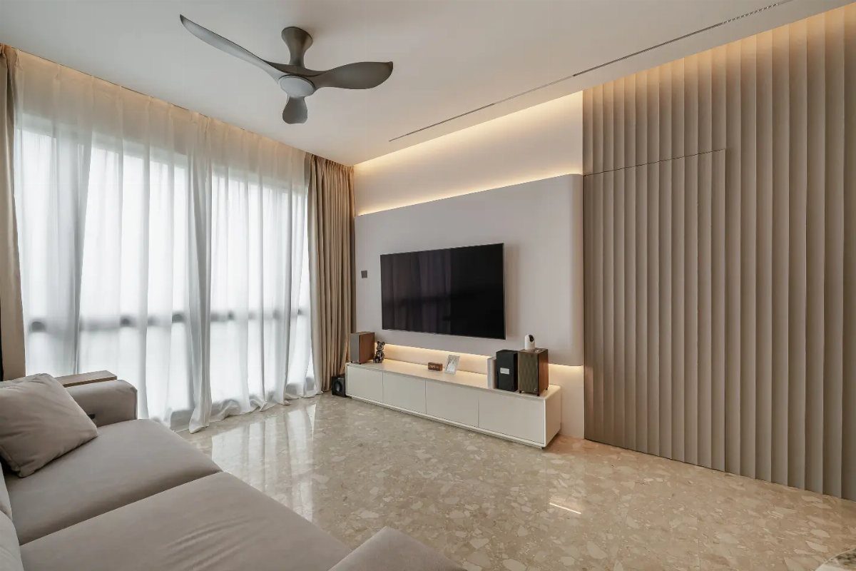9 Hidden Storage Entrance Ideas for Bookshelf Doors and Hidden Hatches 5 Modern living room with a large television and a vertical slat wall concealing a hidden entrance.